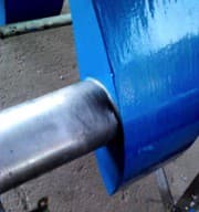 Álabe directriz reconstruido y protegido con el revestimiento polimérico CeramAlloy CL+AC en color azul.
